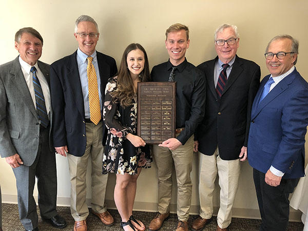 (Left to Right) Dr. Carl Schneider, Executive Director of Northern Minnesota Dental, Dr. Gary Anderson, Dean of the U of M School of Dentistry, Jennifer Enich, Andy Aldrich, Dr. Michael Till, former Dean of the School of Dentistry, and Dr. Michael Zakula,
